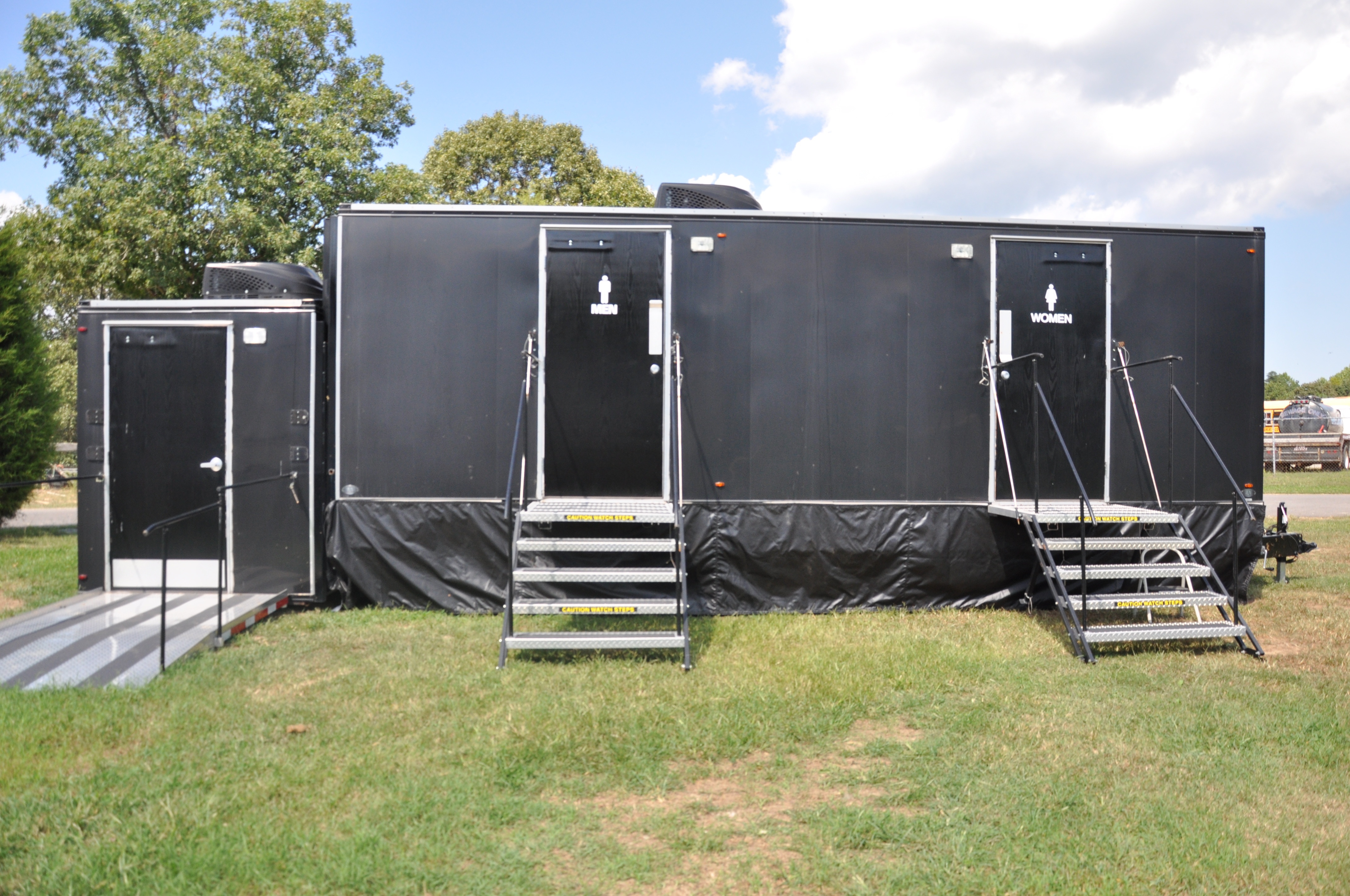 Crowd Pleasers luxury restroom trailer — exterior