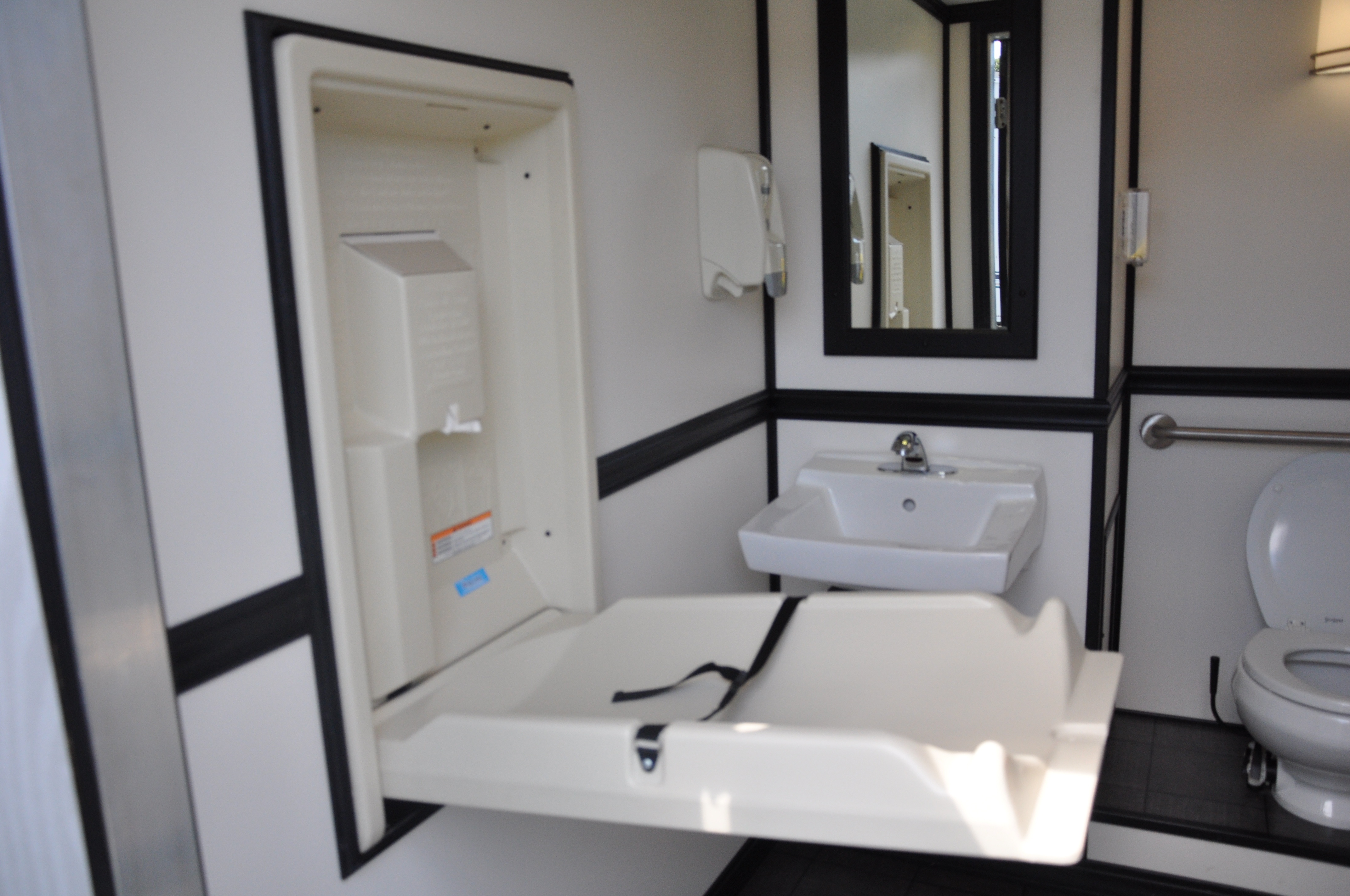 Crowd Pleasers restroom trailer — baby-care unit