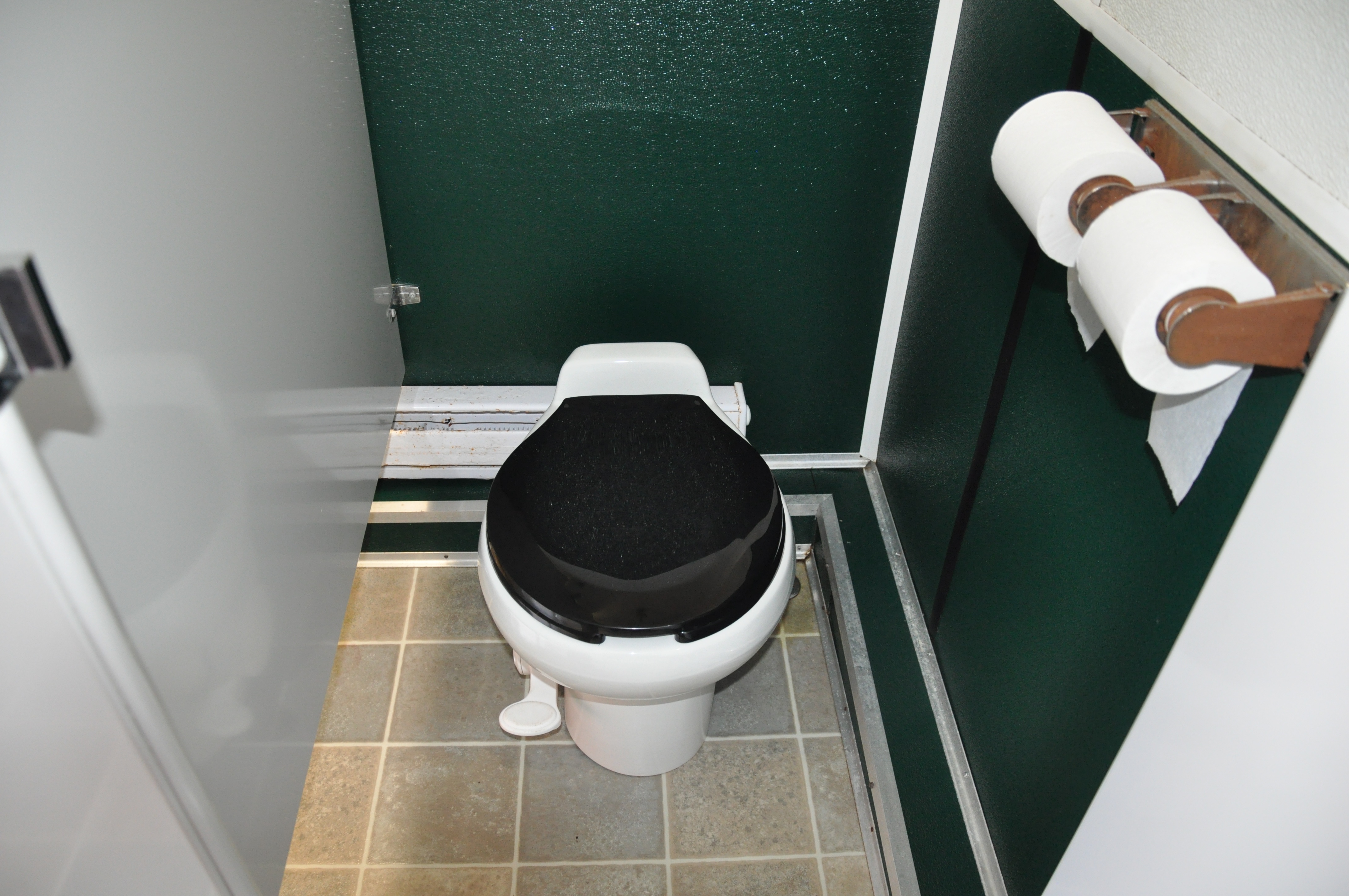Crowd Pleasers event restroom trailer — interior detail